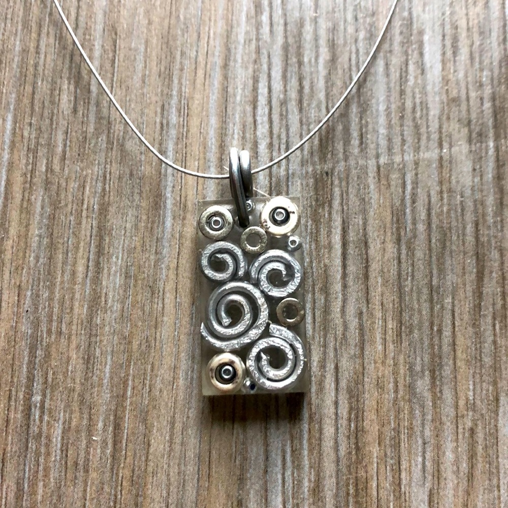Unique silver swirl necklace